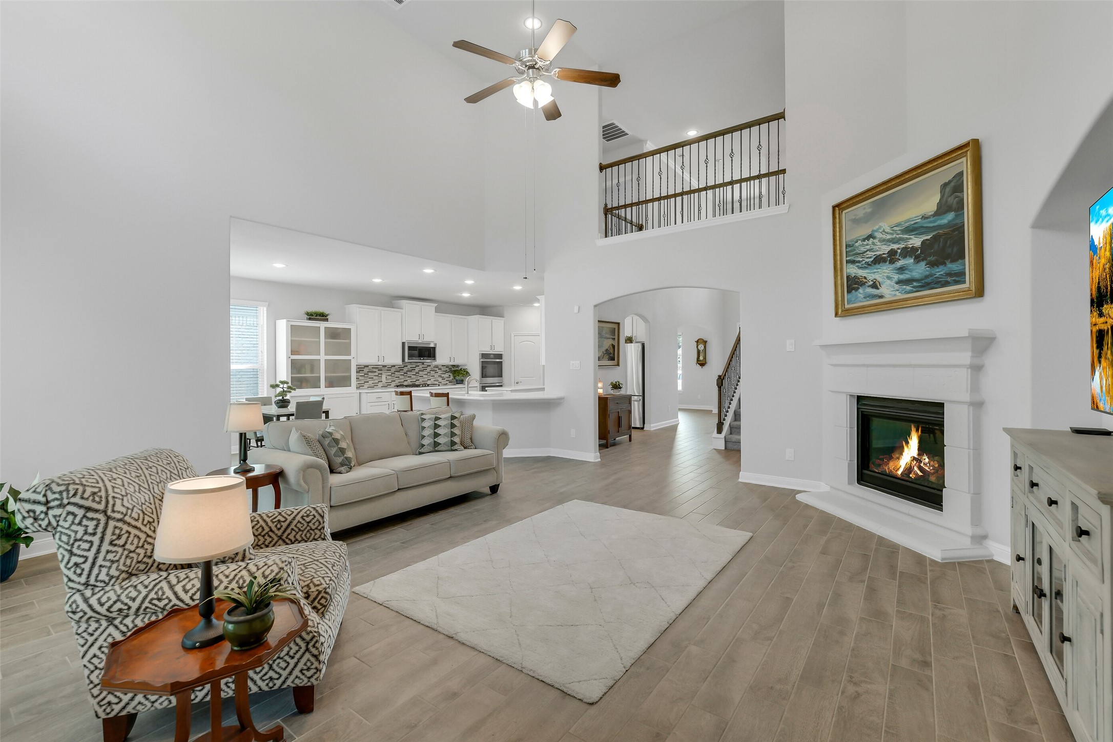 2803 Skerne Forest Dr Spring Spring, TX 77373 - Photo 7 of 44 a living room with furniture and a fireplace