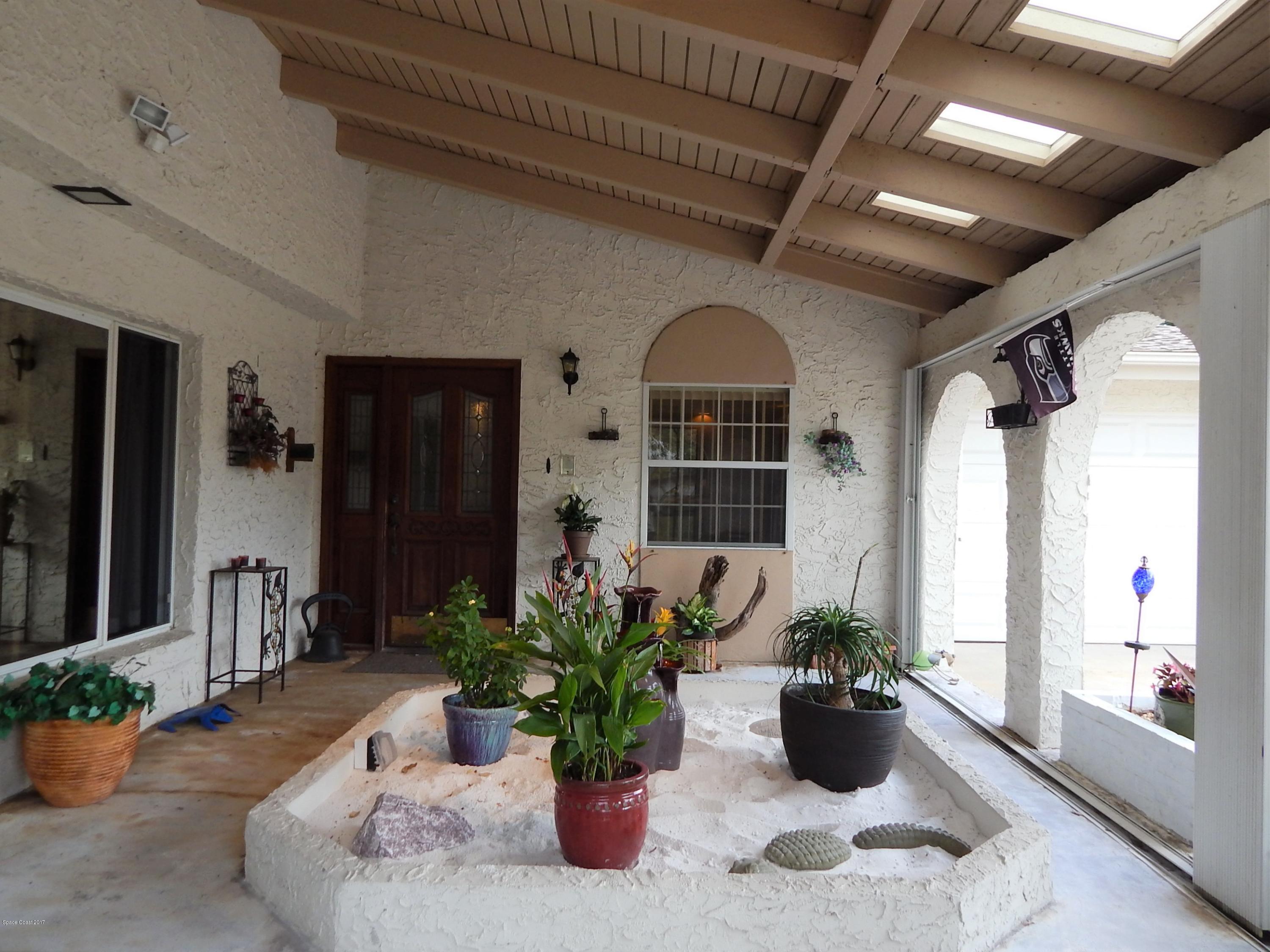 1190 St George Road Merritt Island, FL 32952 - Photo 2 of 29 Courtyard Entry