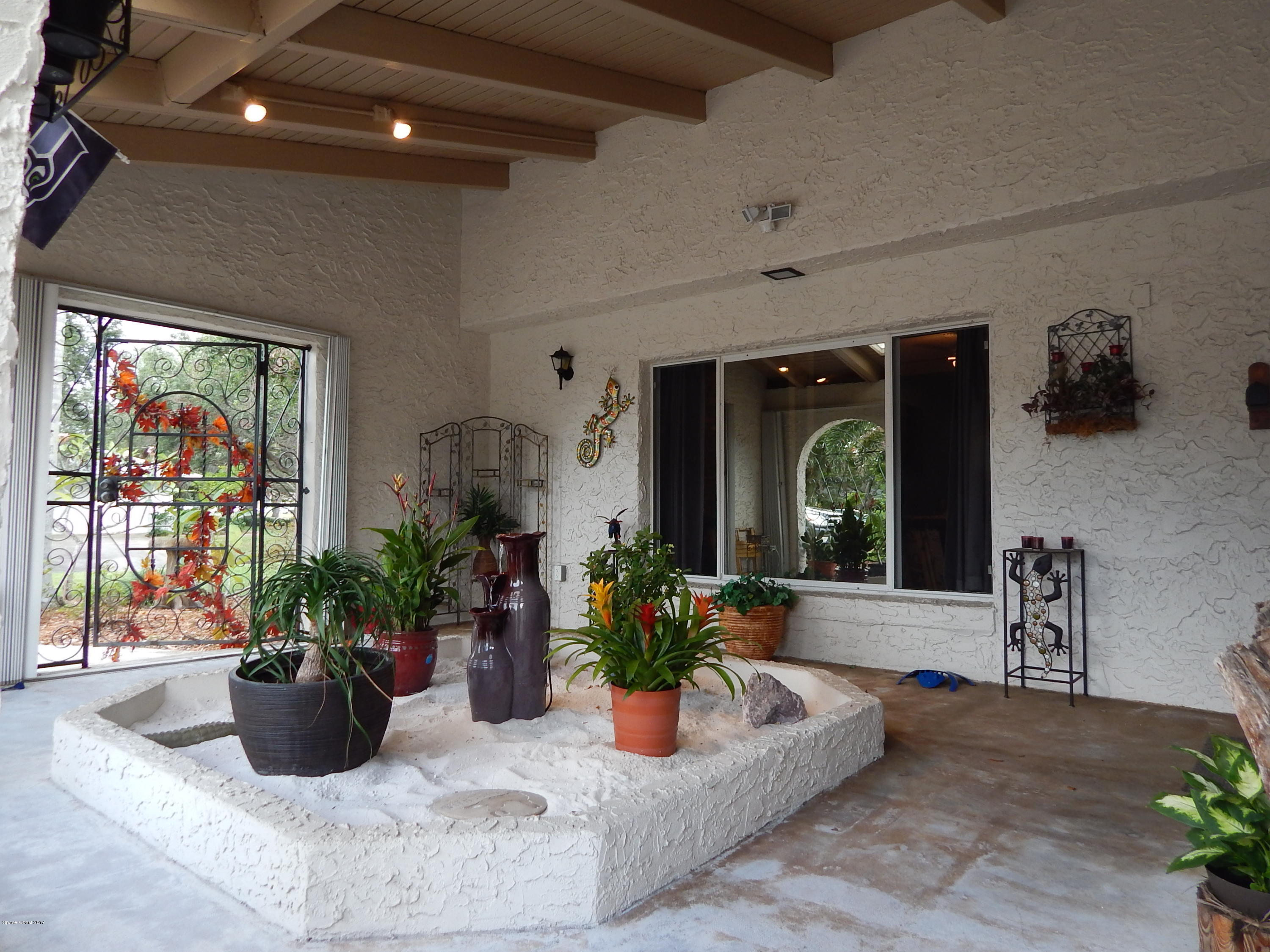 1190 St George Road Merritt Island, FL 32952 - Photo 3 of 29 Courtyard 2