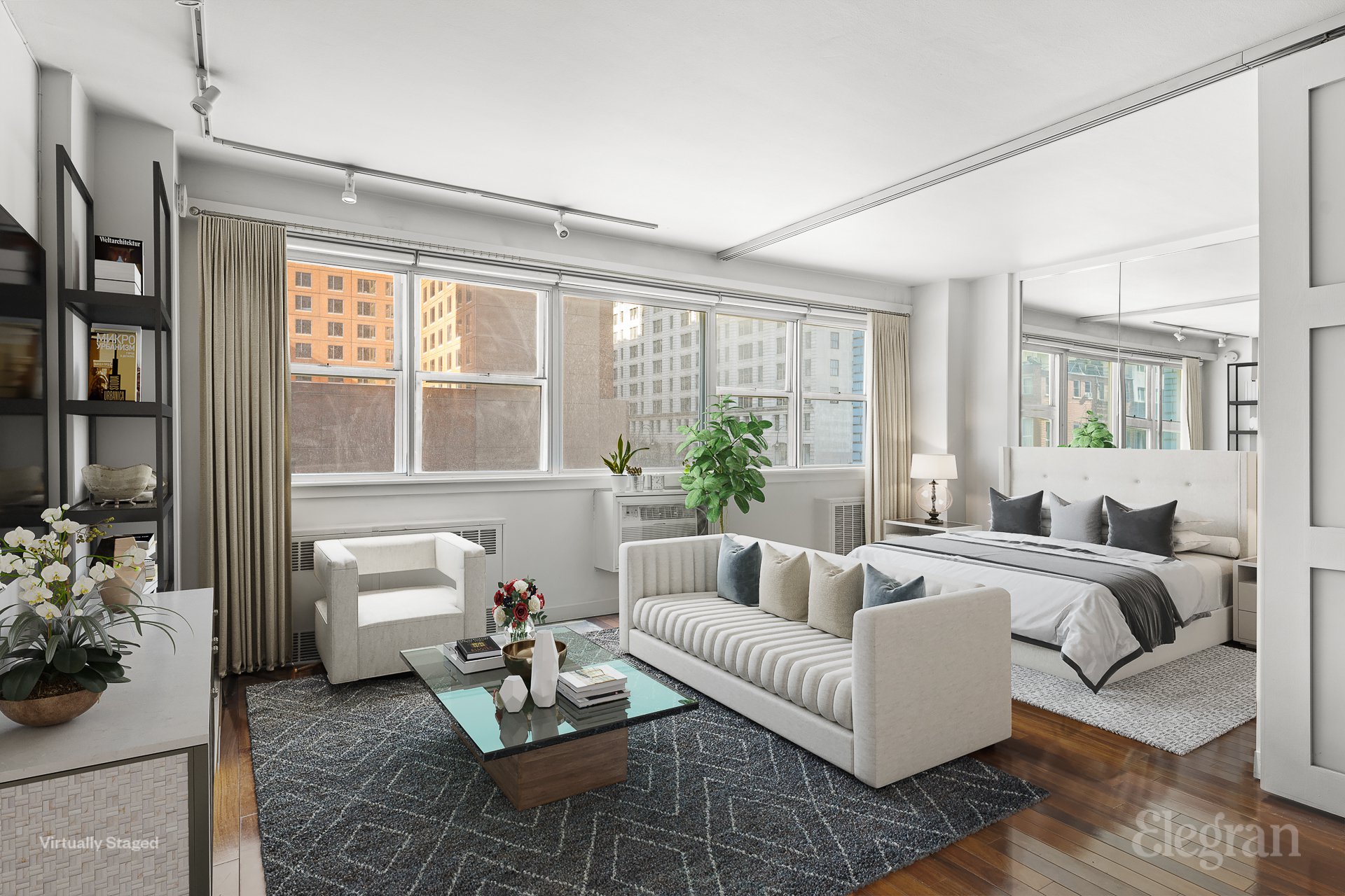 111 3rd Avenue, Unit 4A Manhattan, NY 10003 - Photo 1 of 1 a living room with furniture and a large window