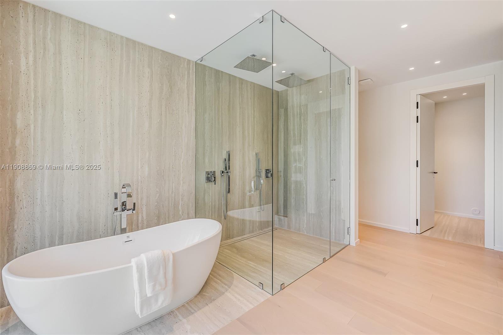 1661 Onaway Drive Miami, FL 33133 - Photo 16 of 26 a bathroom with a bathtub and shower