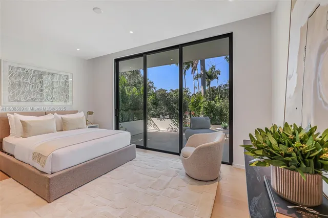 a bathroom with a sink and a large mirror