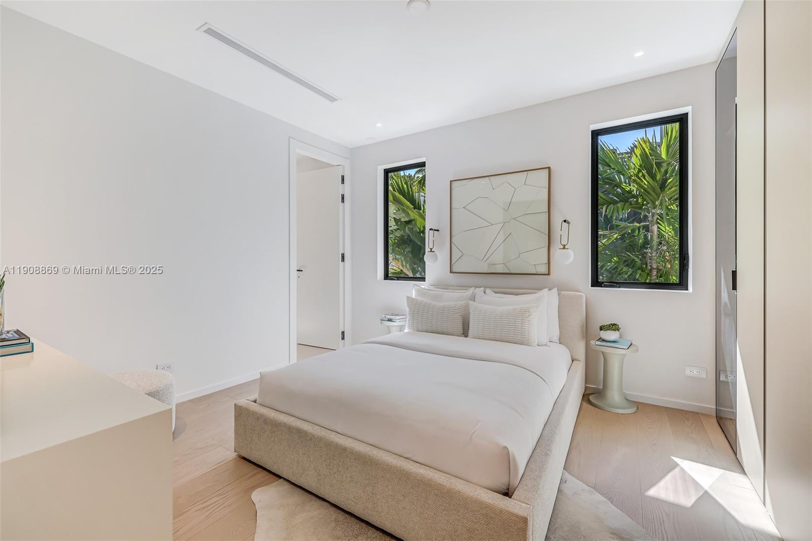 1661 Onaway Drive Miami, FL 33133 - Photo 22 of 26 a bedroom with a bed and a window