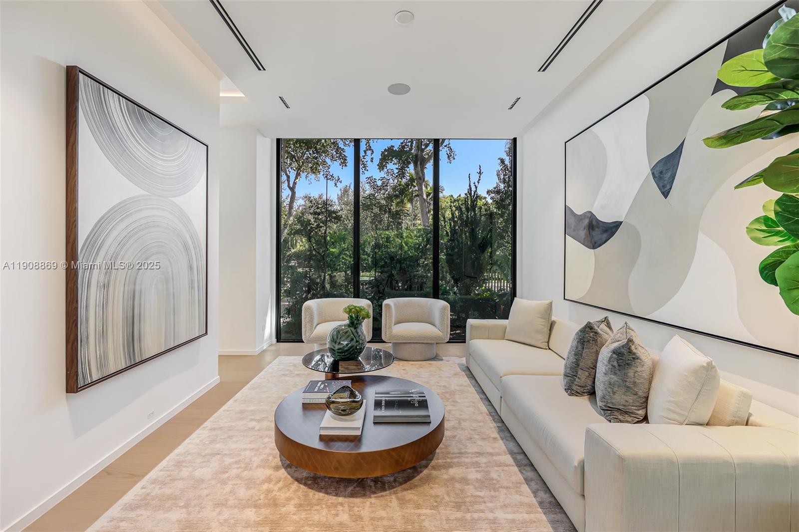 1661 Onaway Drive Miami, FL 33133 - Photo 8 of 26 a living room with furniture and a large window