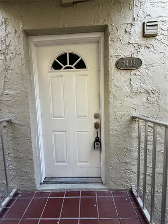 a bathroom with a shower and a mirror
