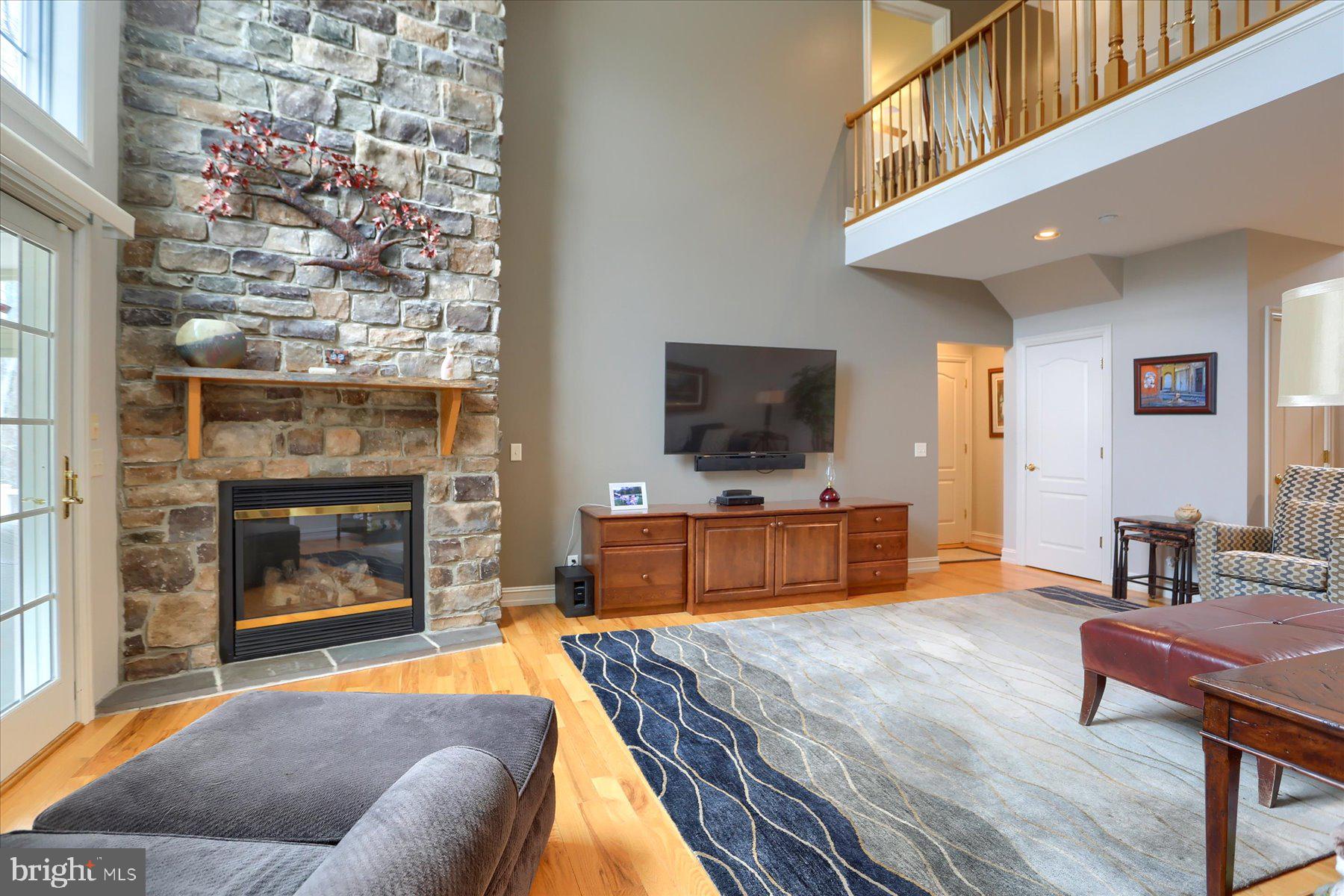 210 South Grantham Road Dillsburg, PA 17019 - Photo 17 of 56 a bedroom with a bed and a flat screen tv