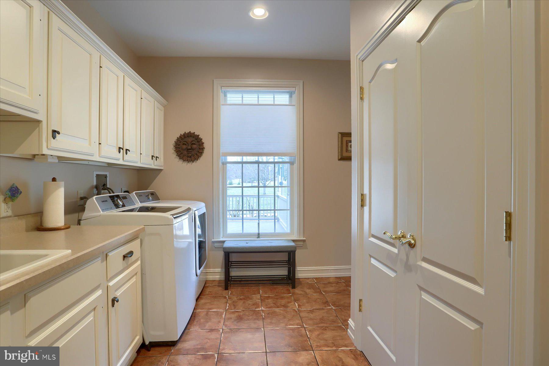 210 South Grantham Road Dillsburg, PA 17019 - Photo 24 of 56 a bathroom with a granite countertop sink a toilet and a window