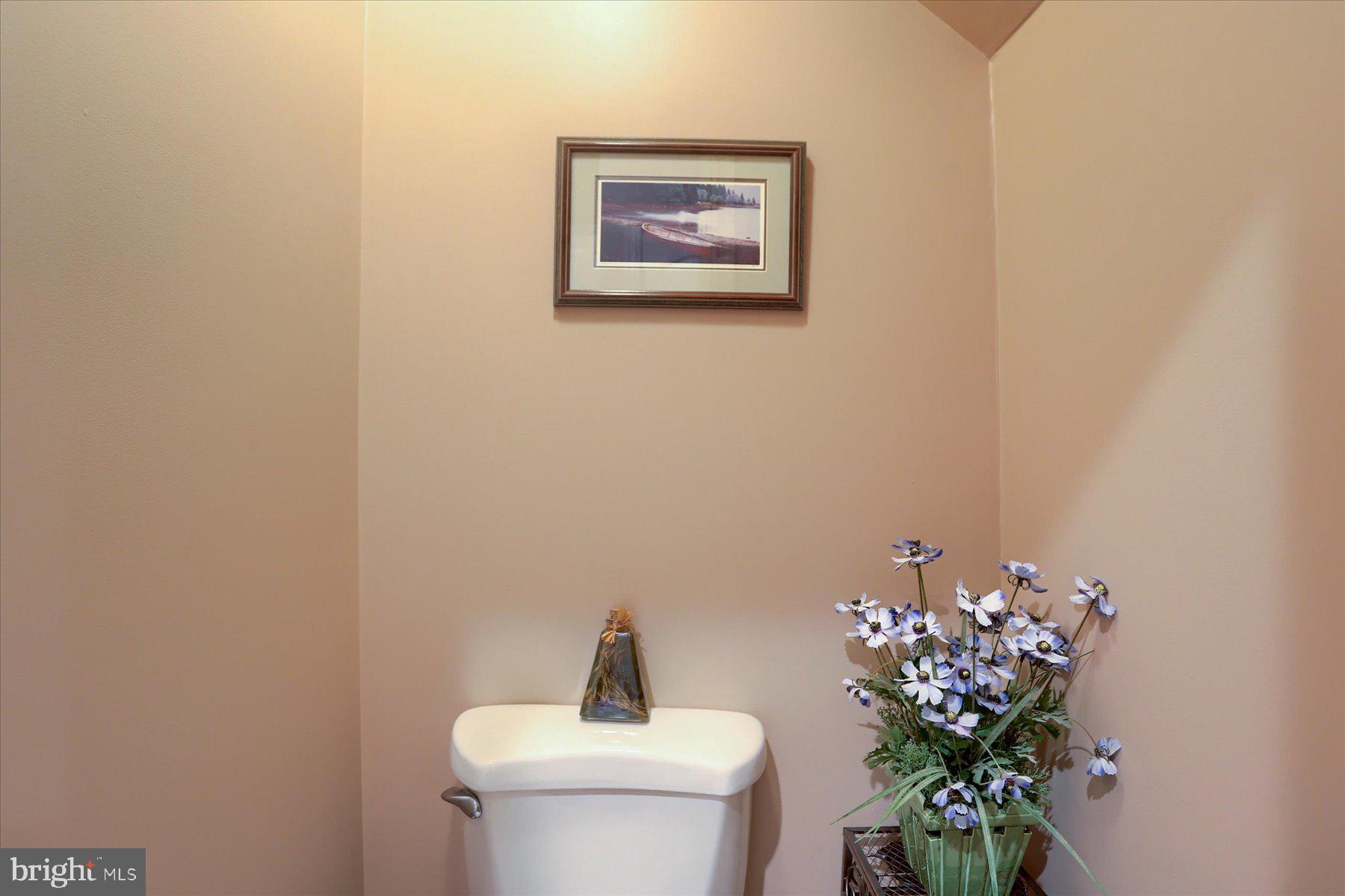 210 South Grantham Road Dillsburg, PA 17019 - Photo 26 of 56 a bathroom with a toilet sink and mirror