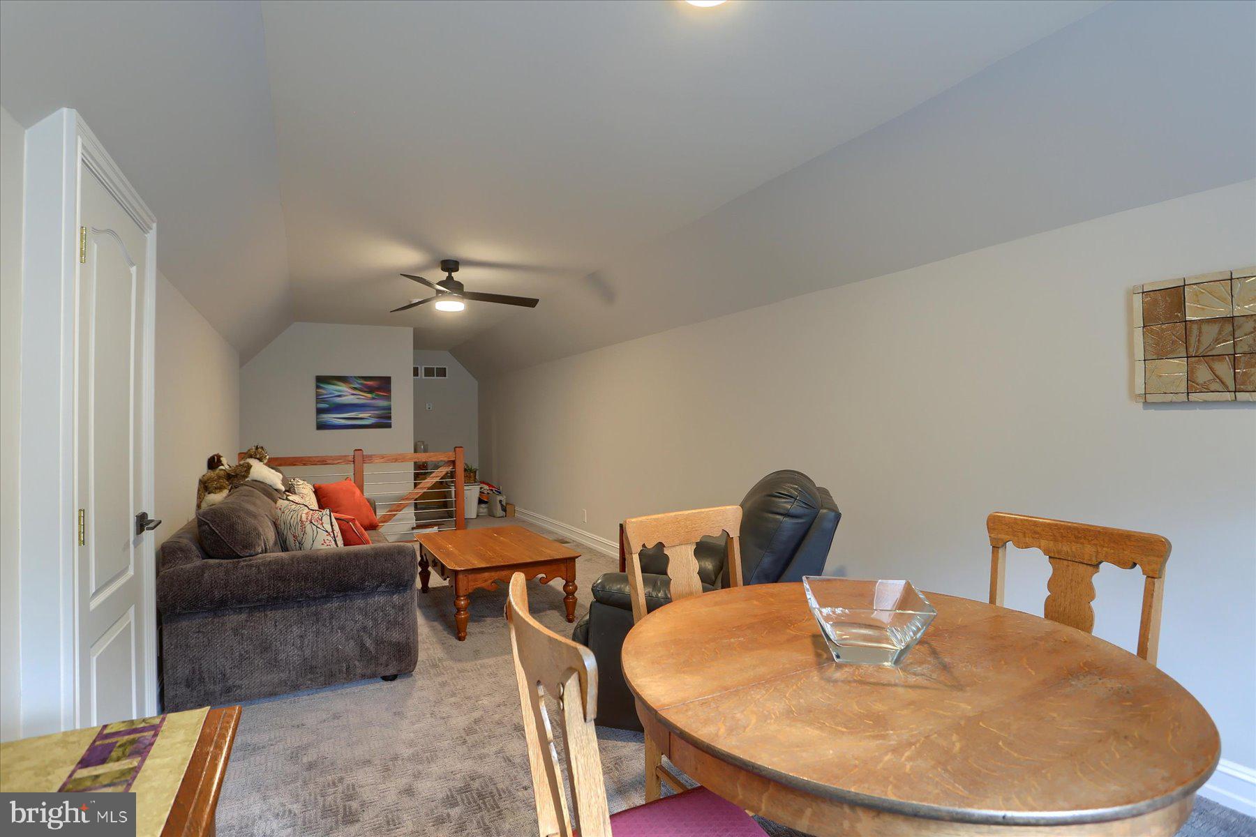 210 South Grantham Road Dillsburg, PA 17019 - Photo 35 of 56 a living room with furniture and a wooden floor
