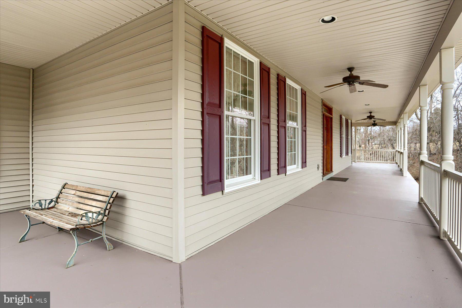 210 South Grantham Road Dillsburg, PA 17019 - Photo 4 of 56 a view of an outdoor space with porch