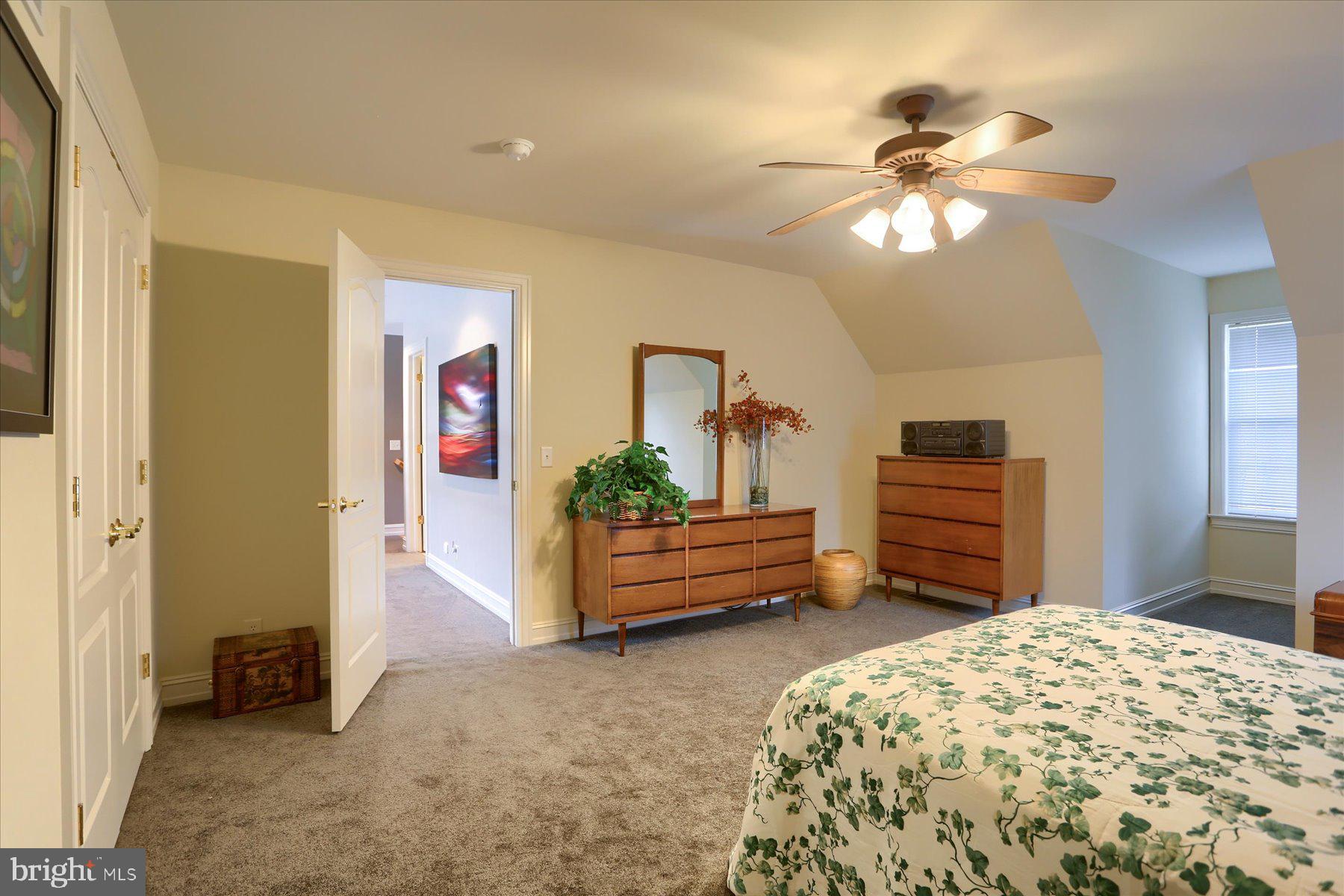 210 South Grantham Road Dillsburg, PA 17019 - Photo 41 of 56 a bed room with a bed and a chandelier