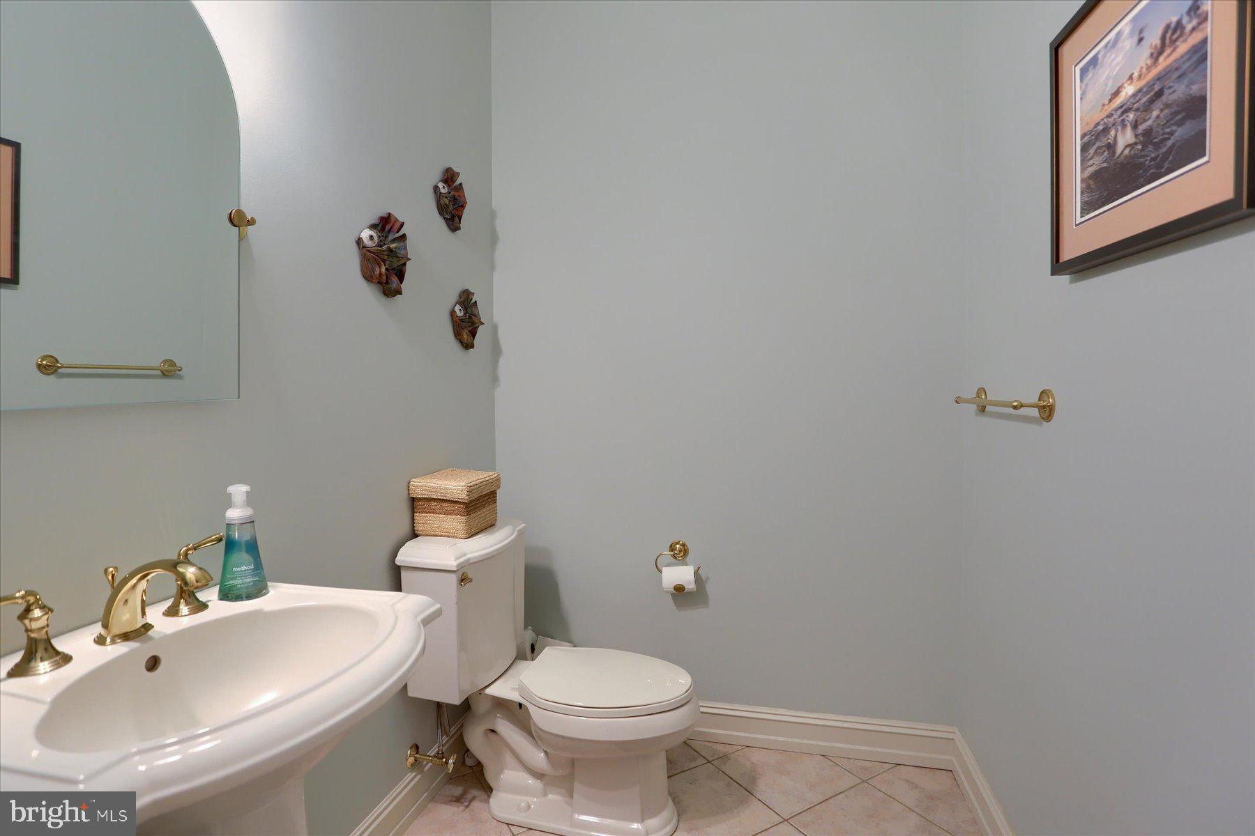 210 South Grantham Road Dillsburg, PA 17019 - Photo 43 of 56 a bathroom with a sink mirror and toilet