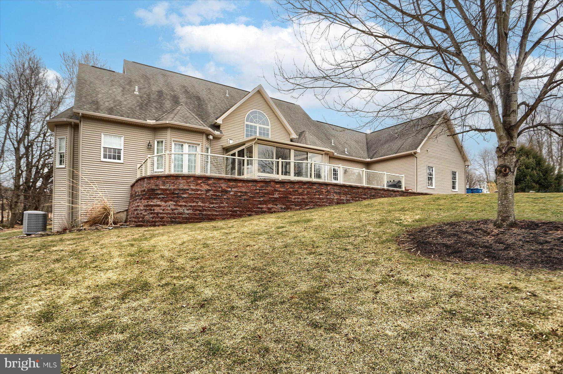 210 South Grantham Road Dillsburg, PA 17019 - Photo 52 of 56 a front view of a house with a yard