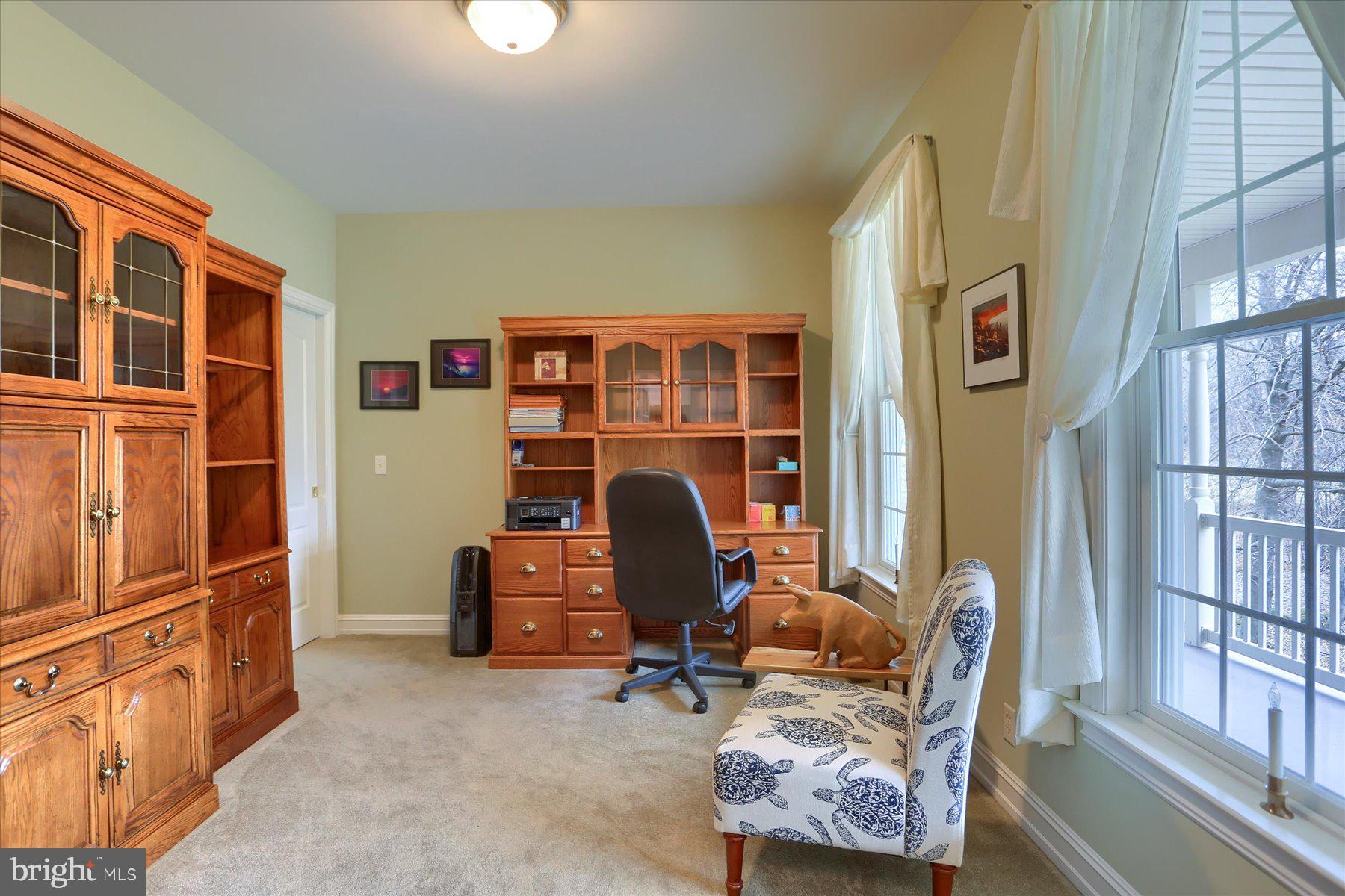 210 South Grantham Road Dillsburg, PA 17019 - Photo 8 of 56 a living room with furniture and a window