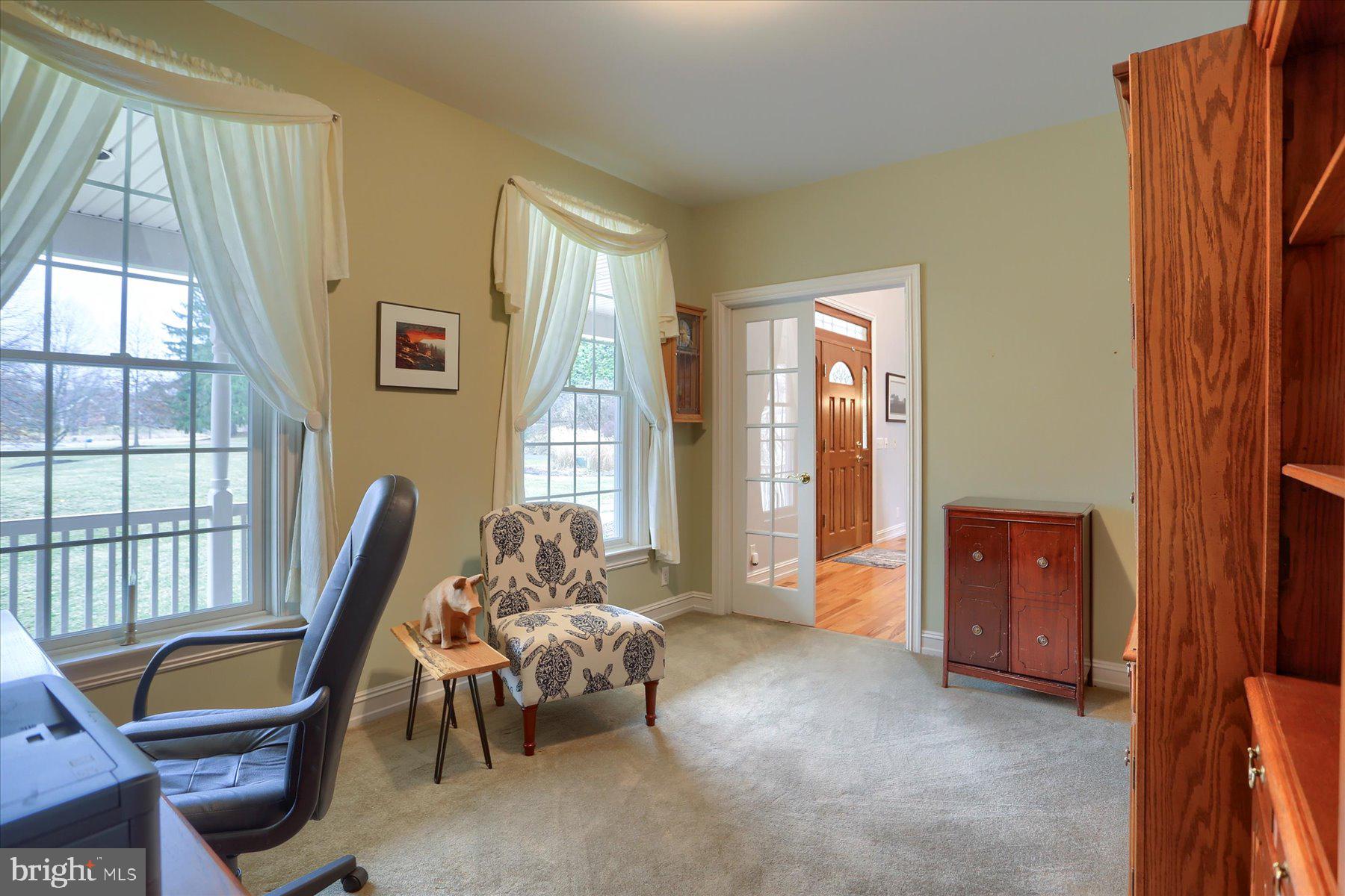 210 South Grantham Road Dillsburg, PA 17019 - Photo 9 of 56 a living room with furniture and a window