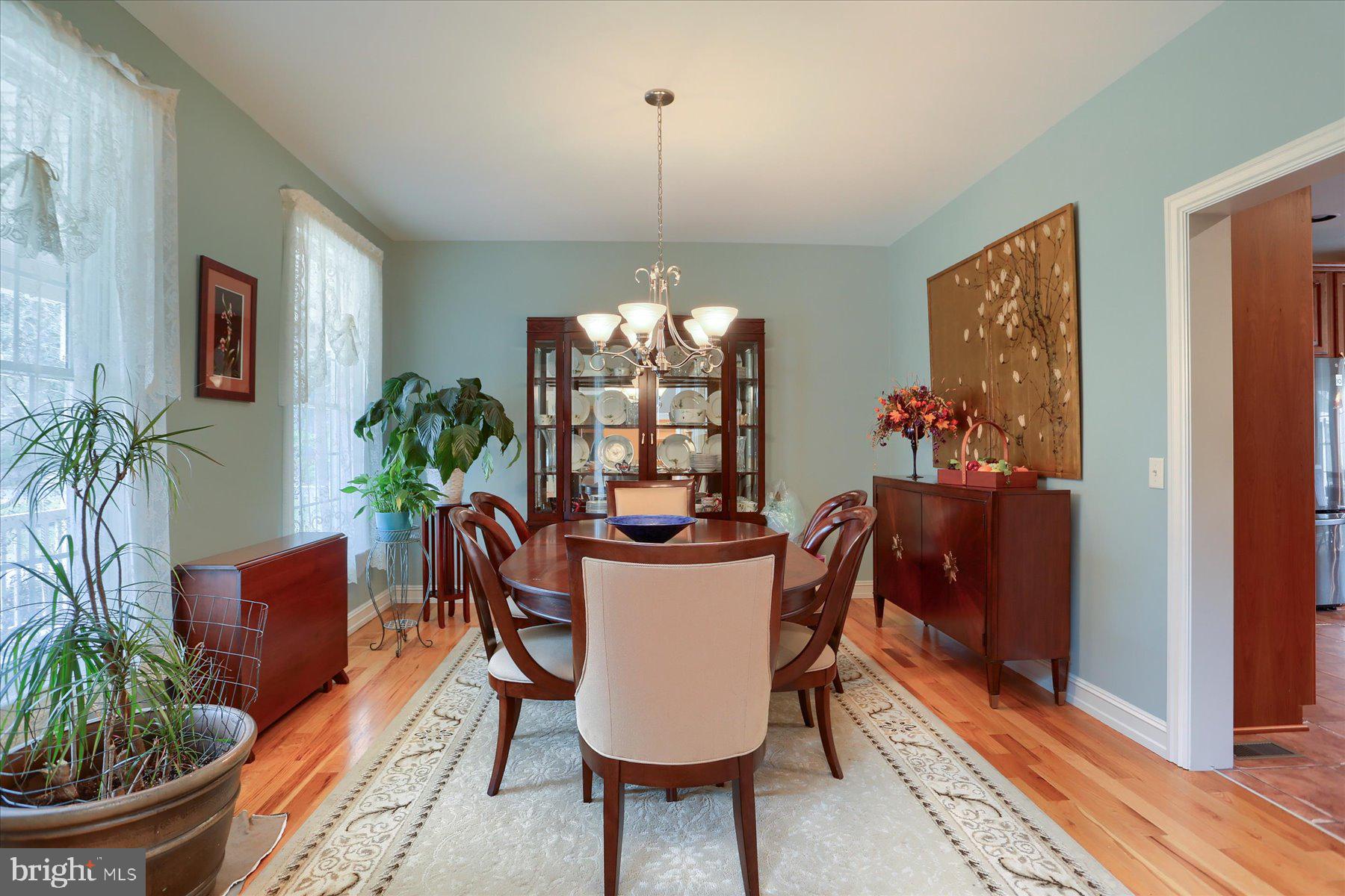 210 South Grantham Road Dillsburg, PA 17019 - Photo 10 of 56 a view of a dining room with furniture window and wooden floor