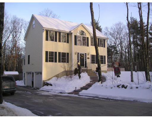 138 Gray Road Templeton, MA 01468 - Photo 1 of 29 a view of a white house with a yard and sitting area