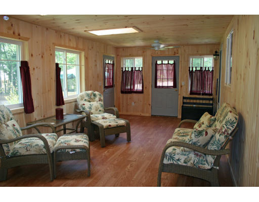 138 Gray Road Templeton, MA 01468 - Photo 12 of 29 a living room with furniture and wooden floor