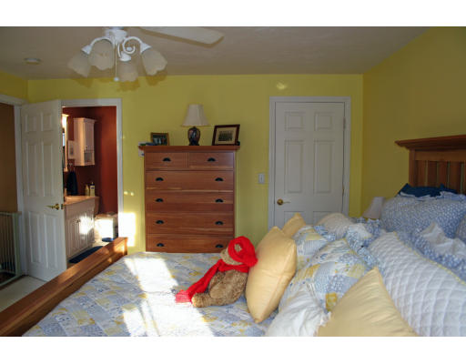 138 Gray Road Templeton, MA 01468 - Photo 22 of 29 a bedroom with a bed and dresser