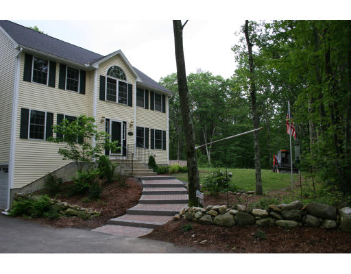 138 Gray Road Templeton, MA 01468 - Photo 4 of 29 a view of a house with backyard and trees