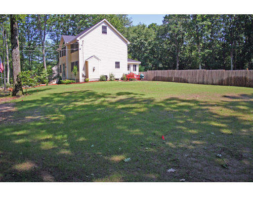 138 Gray Road Templeton, MA 01468 - Photo 5 of 29 a view of open white house with a small yard and big trees