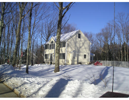 138 Gray Road Templeton, MA 01468 - Photo 6 of 29 a view of a building with snow on the road