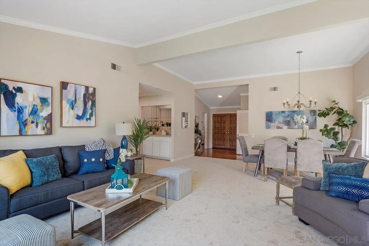3355 Lower Ridge Road San Diego, CA 92130 - Photo 12 of 31 a living room with furniture and wooden floor