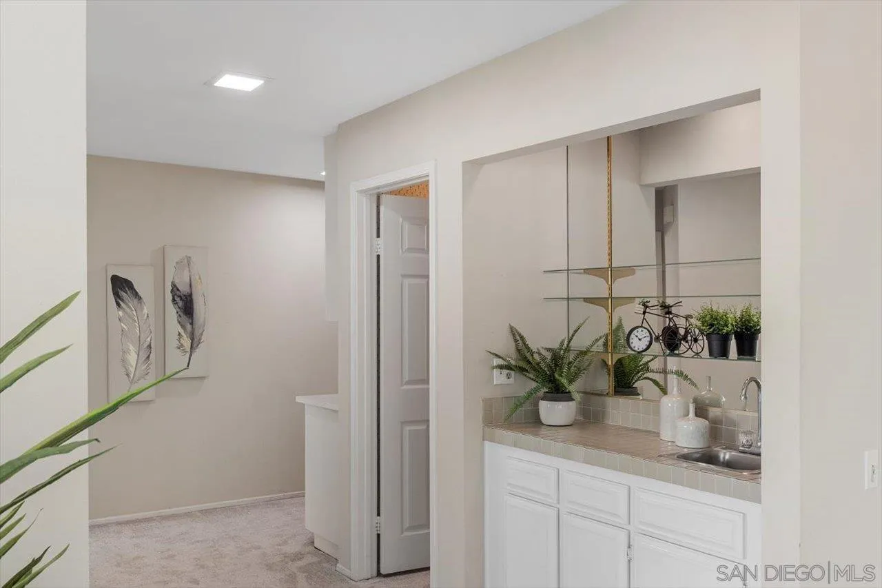 3355 Lower Ridge Road San Diego, CA 92130 - Photo 18 of 31 a view of bathroom with a potted plant
