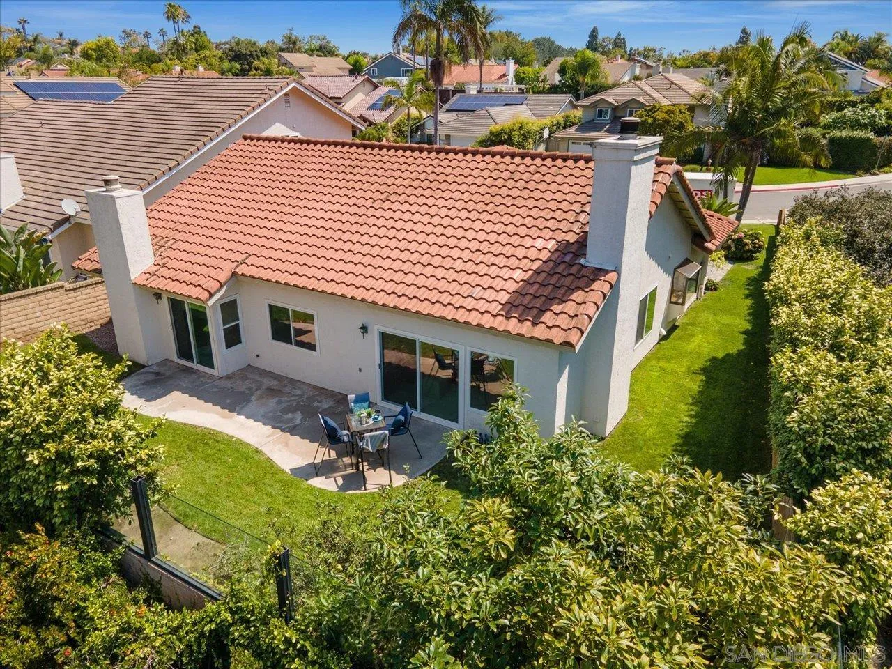 3355 Lower Ridge Road San Diego, CA 92130 - Photo 30 of 31 front view of a house with a patio