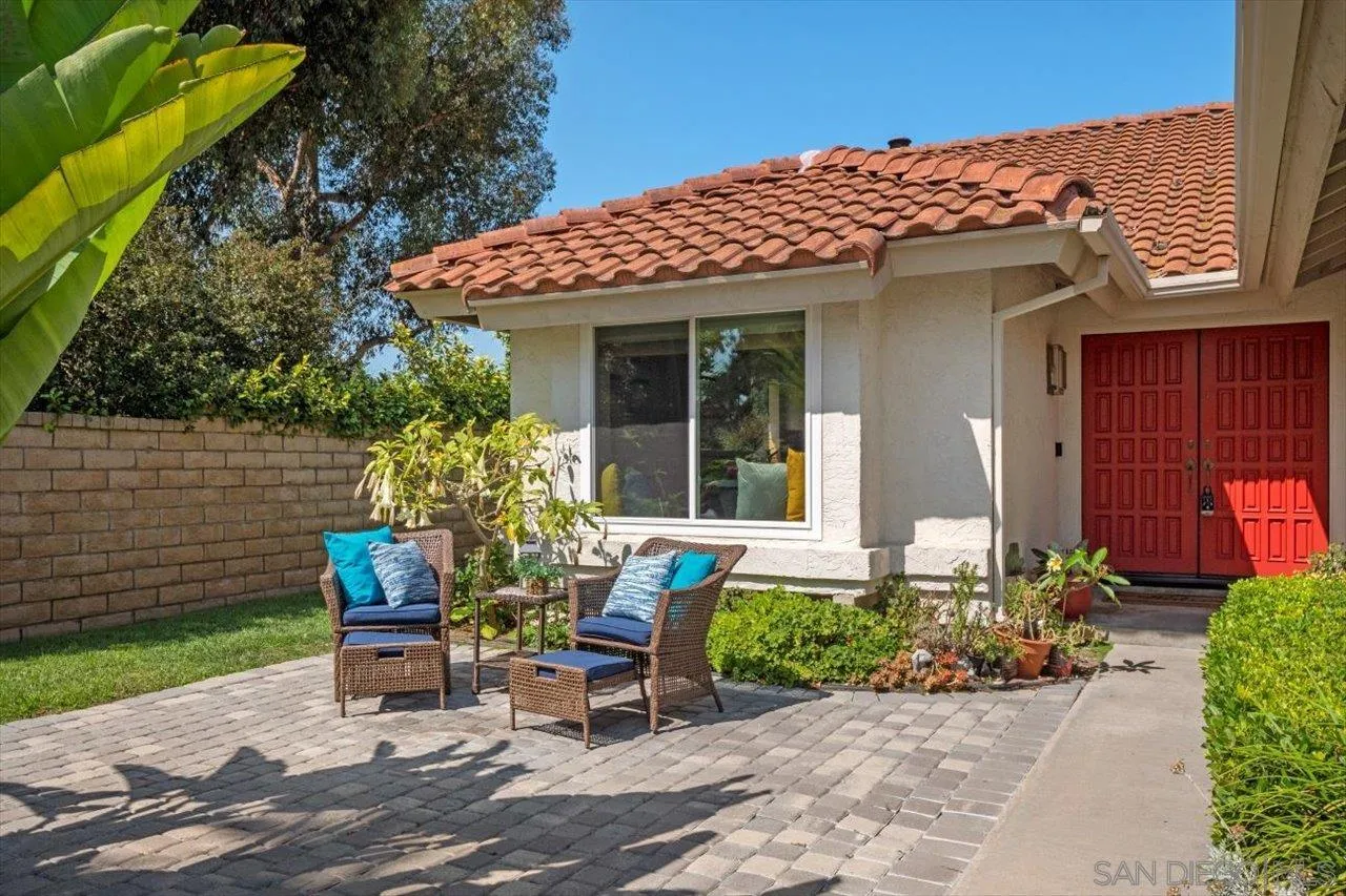 3355 Lower Ridge Road San Diego, CA 92130 - Photo 3 of 31 a view of a house with chairs and plants