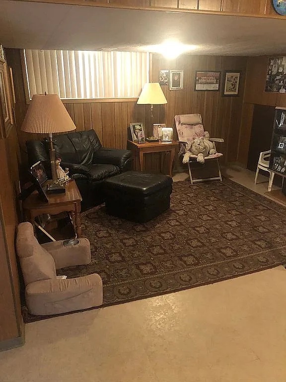 1342 Clinton Avenue Berwyn, IL 60402 - Photo 15 of 16 a living room with furniture and a lamp