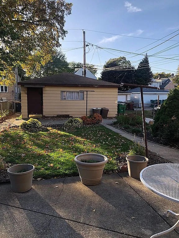 1342 Clinton Avenue Berwyn, IL 60402 - Photo 3 of 16 a view of a backyard with sitting area and furniture