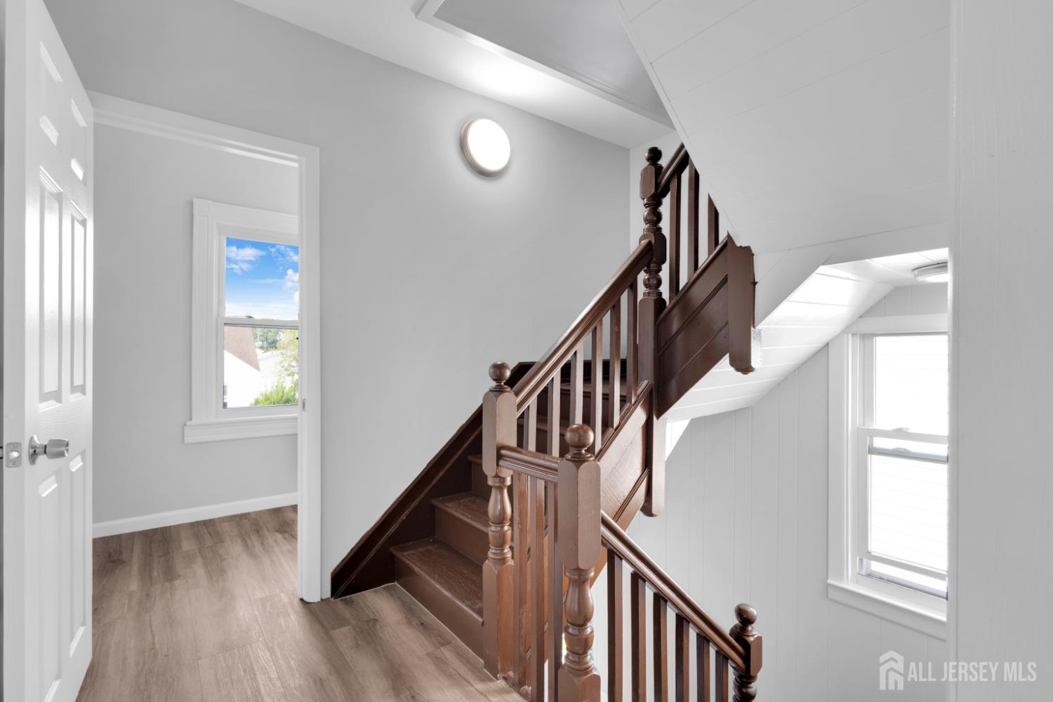 36 3rd Avenue, Unit B Port Reading, NJ 07064 - Photo 14 of 21 a view of entryway and hall with wooden floor
