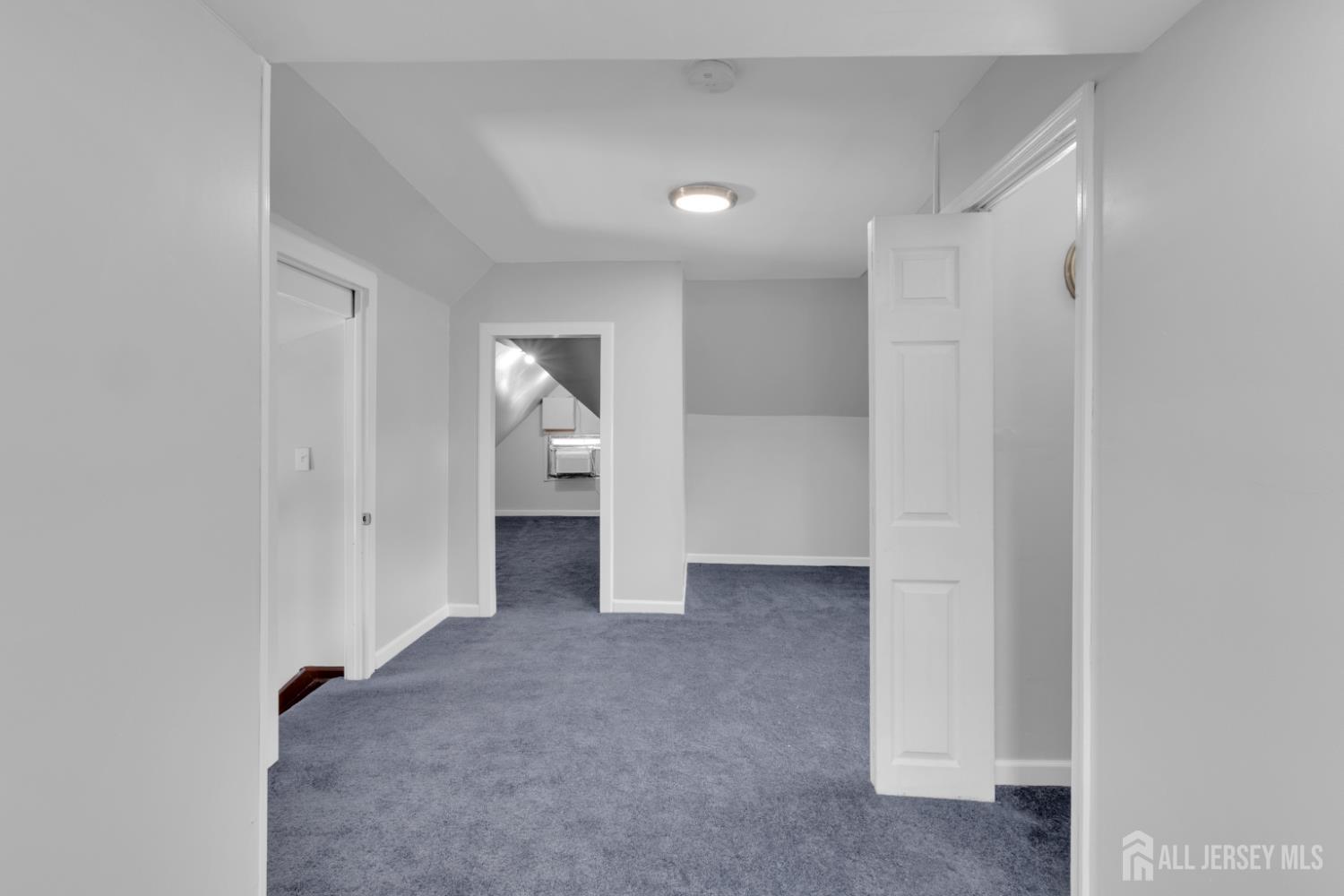 36 3rd Avenue, Unit B Port Reading, NJ 07064 - Photo 16 of 21 a view of a big room with closet and bathroom