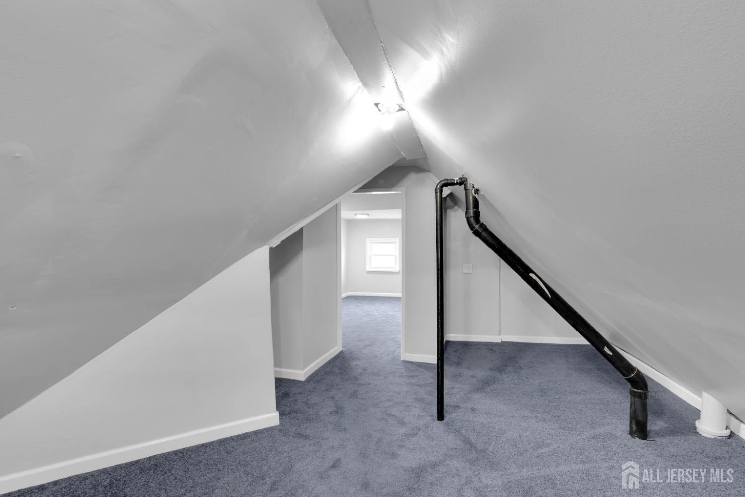 36 3rd Avenue, Unit B Port Reading, NJ 07064 - Photo 18 of 21 a view of a hallway with staircase