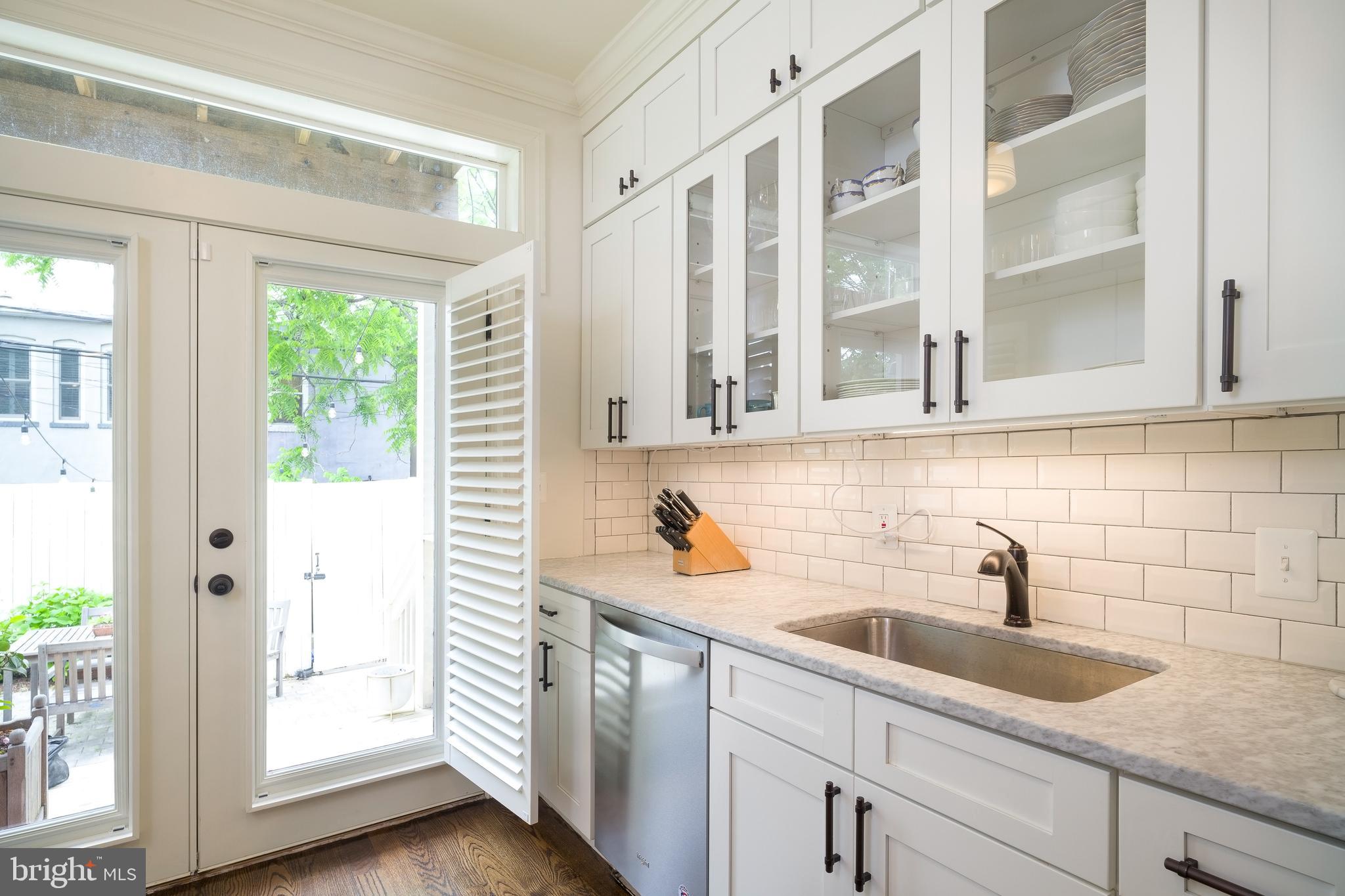 1328 E Street Northeast Washington, DC 20002 - Photo 11 of 34 The plantation shutters here close for privacy