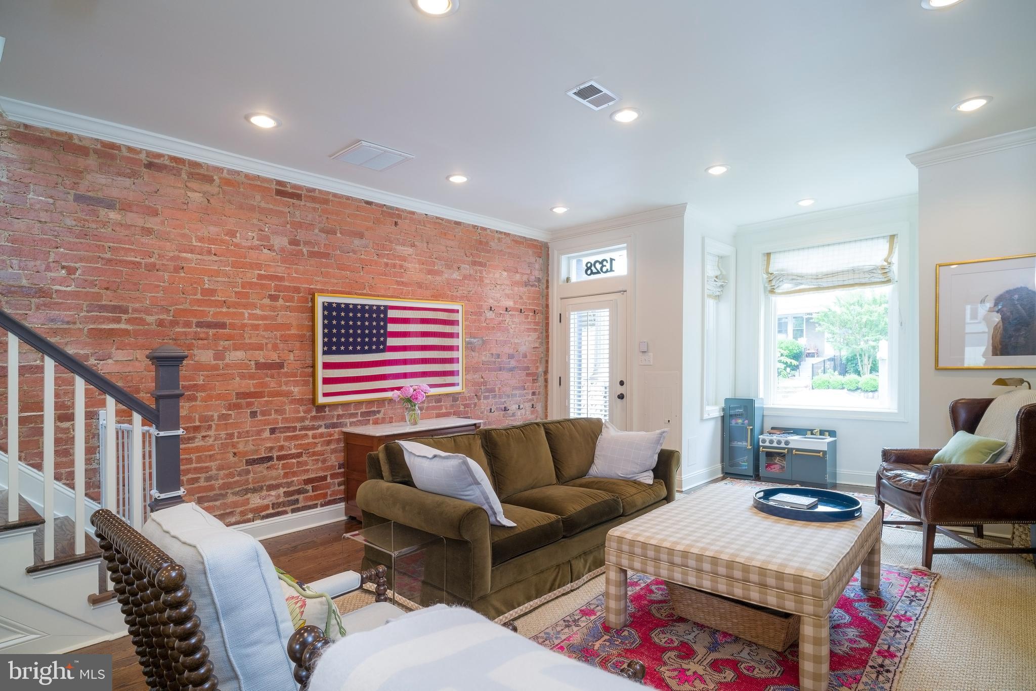 1328 E Street Northeast Washington, DC 20002 - Photo 3 of 34 Southern exposure pushes light through the home.
