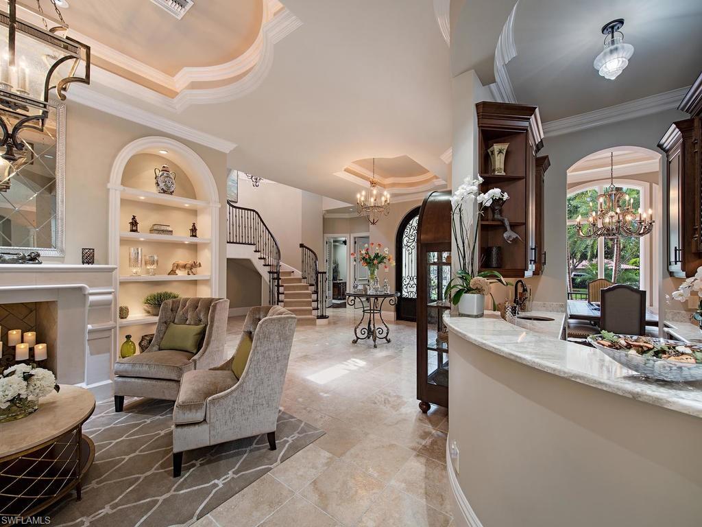 515 Riviera Drive Naples, FL 34103 - Photo 8 of 35 a very nice looking room with many windows