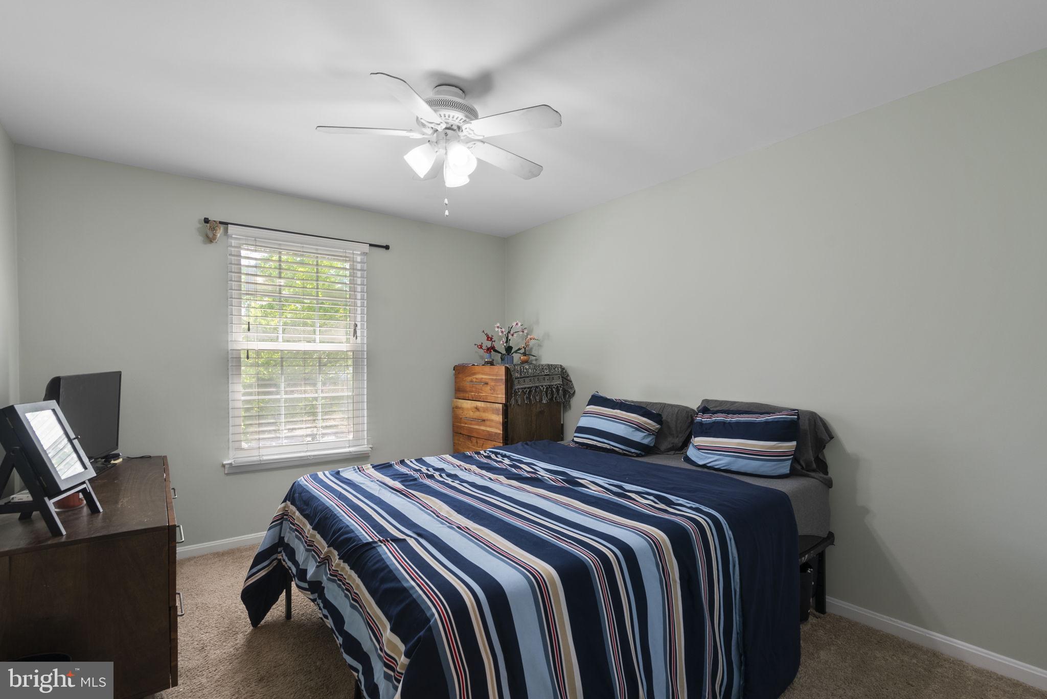 15048 Shamrock Ridge Road Silver Spring, MD 20906 - Photo 18 of 34 Serene bedroom with natural light.