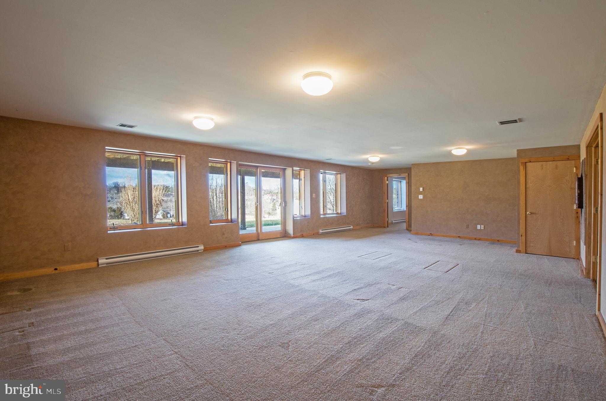 16 Iron Bridge Road Pipersville, PA 18947 - Photo 39 of 68 Lower level family room