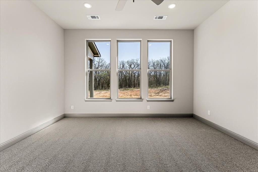 131 Spring Valley Road Paradise, TX 76073 - Photo 18 of 40 an empty room with a window
