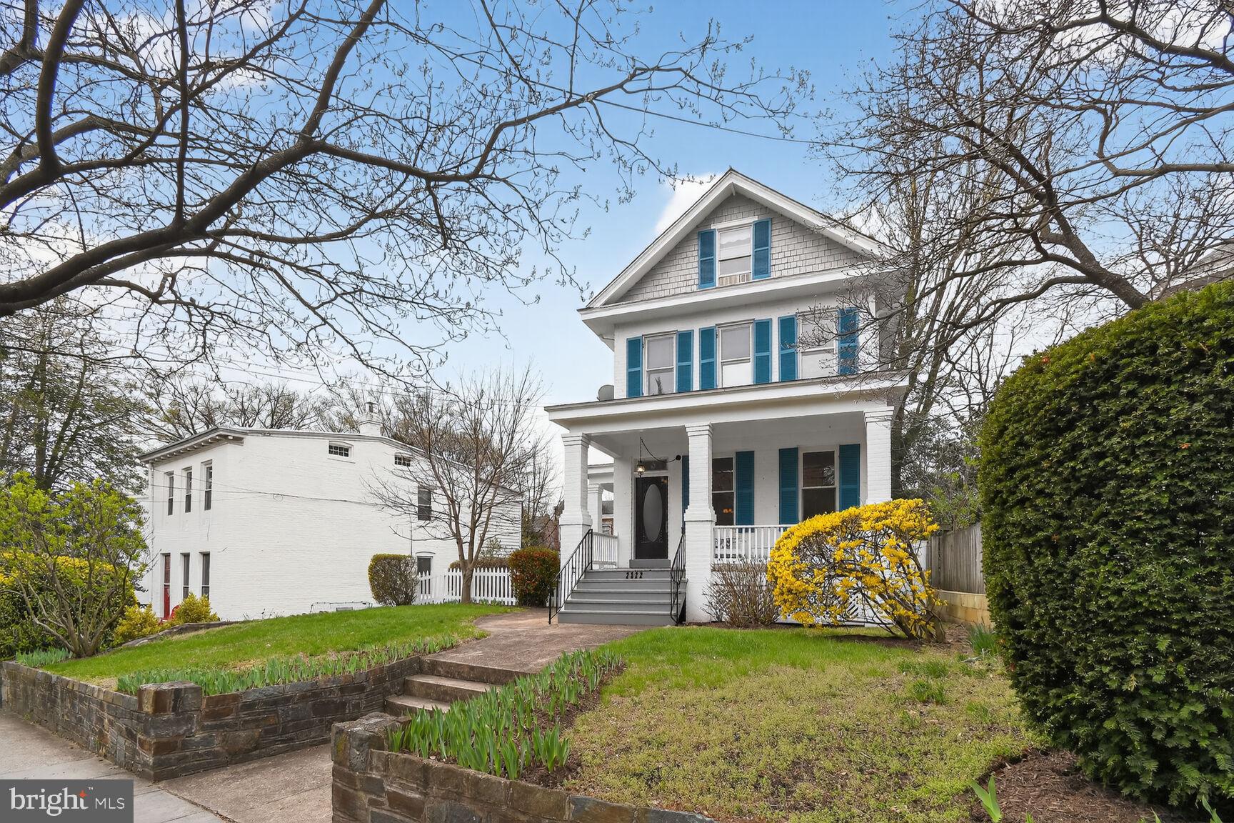 2322 37th Street Northwest Washington, DC 20007 - Photo 52 of 52 a view of a house with a yard and large tree