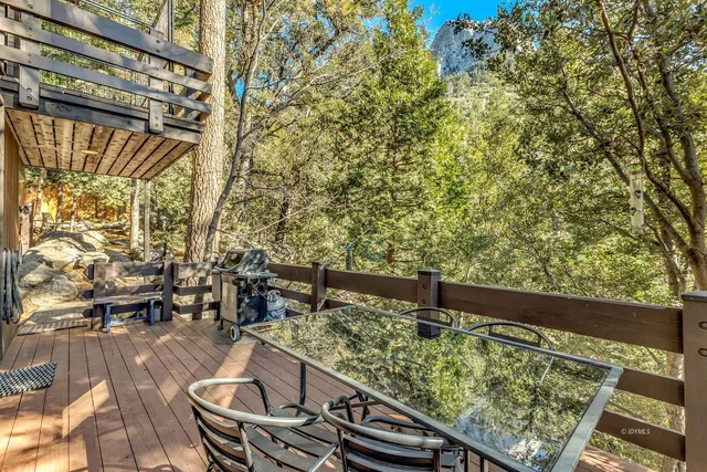 a kitchen with stainless steel appliances granite countertop a sink and a counter top space