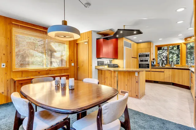a bathroom with a shower and a sink