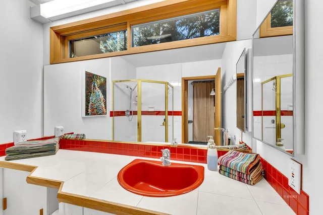 front view of a building with a tree