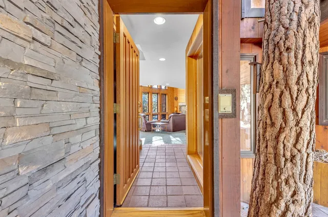 a view of a chairs and table on the wooden floor