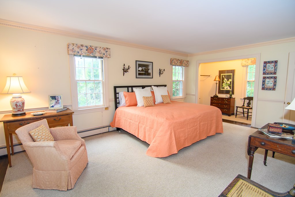23347 Back Street Accomac, VA 23301 - Photo 12 of 44 1st Floor Primary, Features include private bath, WIC, crown molding and hardwood floors.