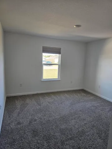 a view of a window in an empty room