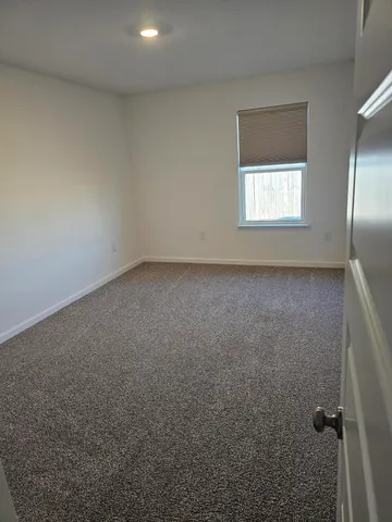 wooden floor and window in a room