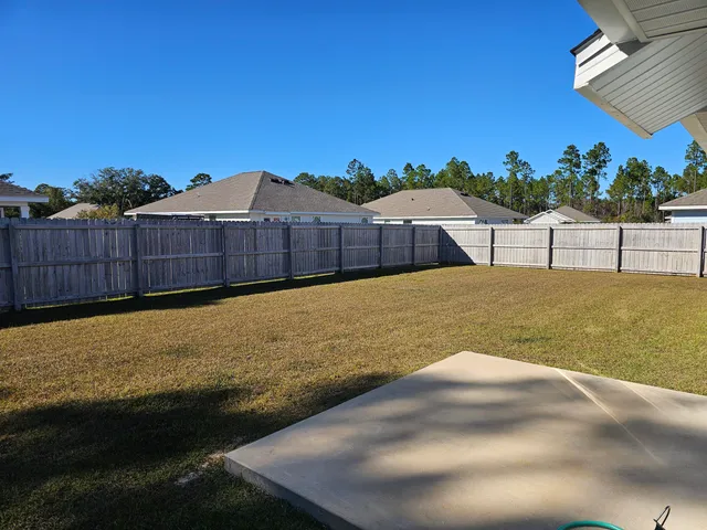a view of an outdoor space and swimming pool